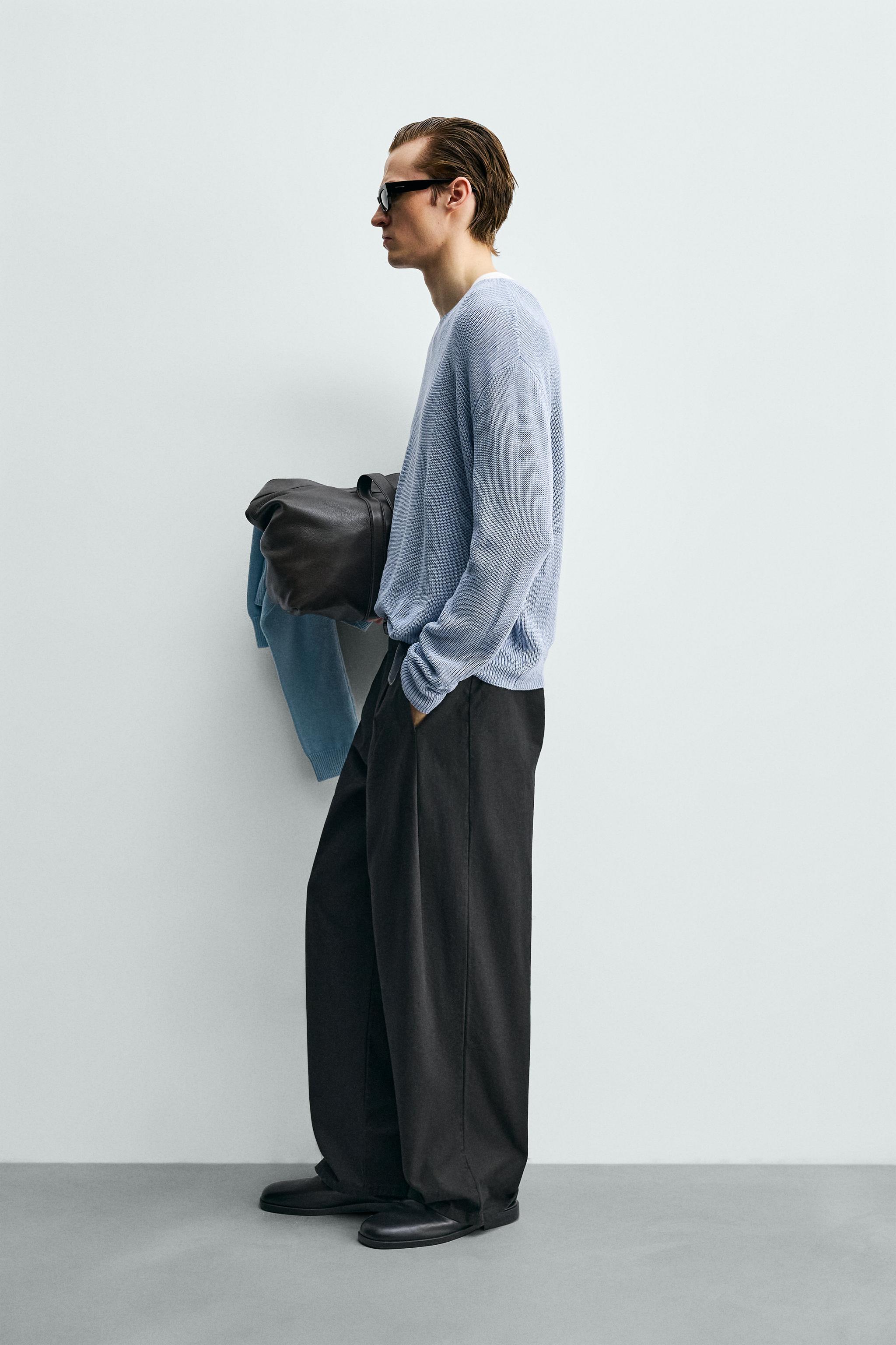 WIDE FIT PLEATED PANTS
